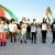 On Friday, March 3rd 2019, to mark International women’s day, feminist activists from both sides of the fence besieging the Gaza strip, joined the Great March of Return. The Jewish Women waved Palestinian flags and held a banner in Arabic that read “Jews for Return” which could be seen by the demonstrators in Gaza. They also carried pictures of the Palestinians shot dead by Israeli soldiers while participating in the Great March of Return. The activists east of the fence were pushed back by soldiers but continued their demonstration.